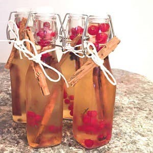 Homemade gin in swing top jars